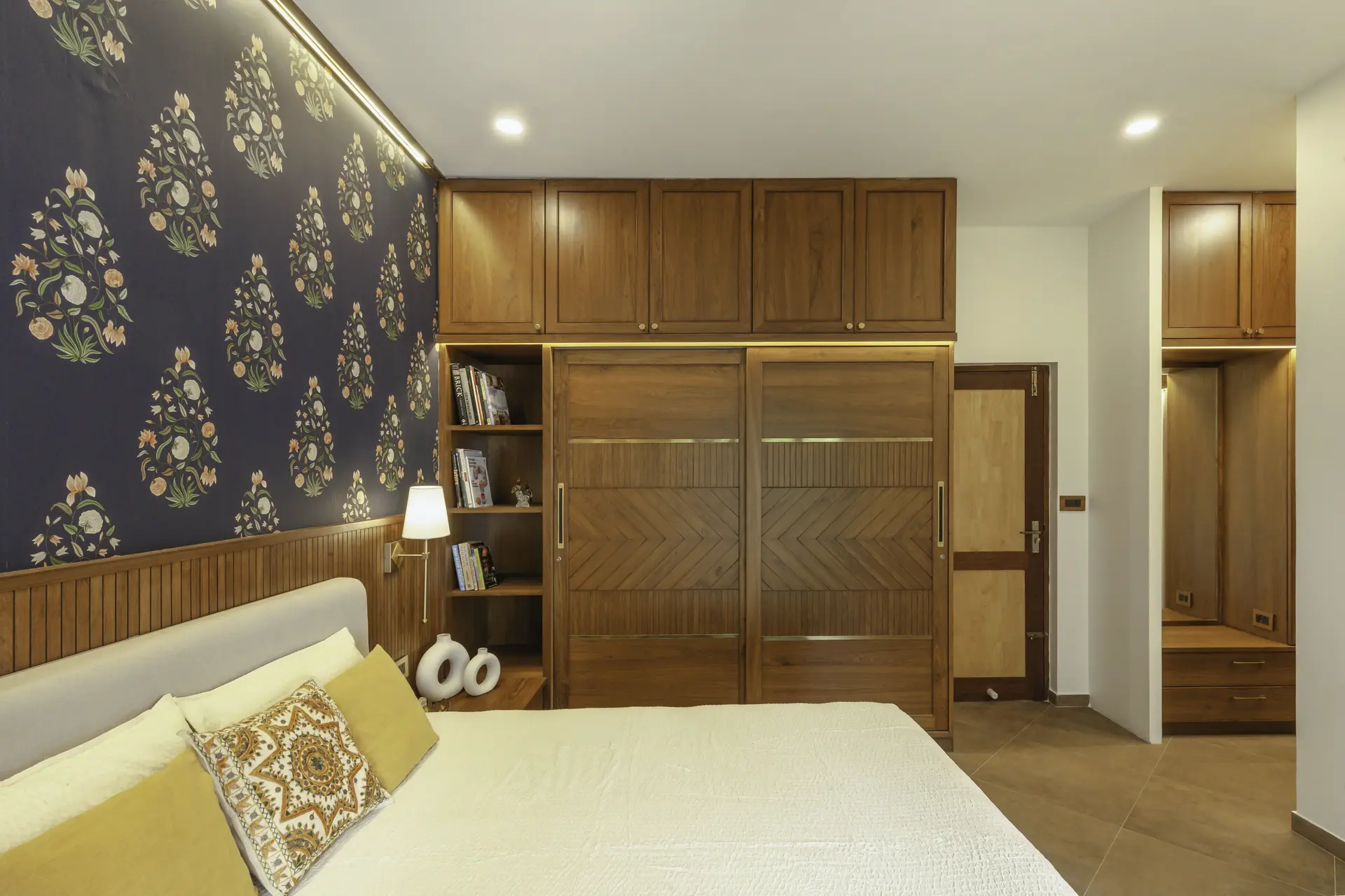 Teak finish wardrobes in master bedroom